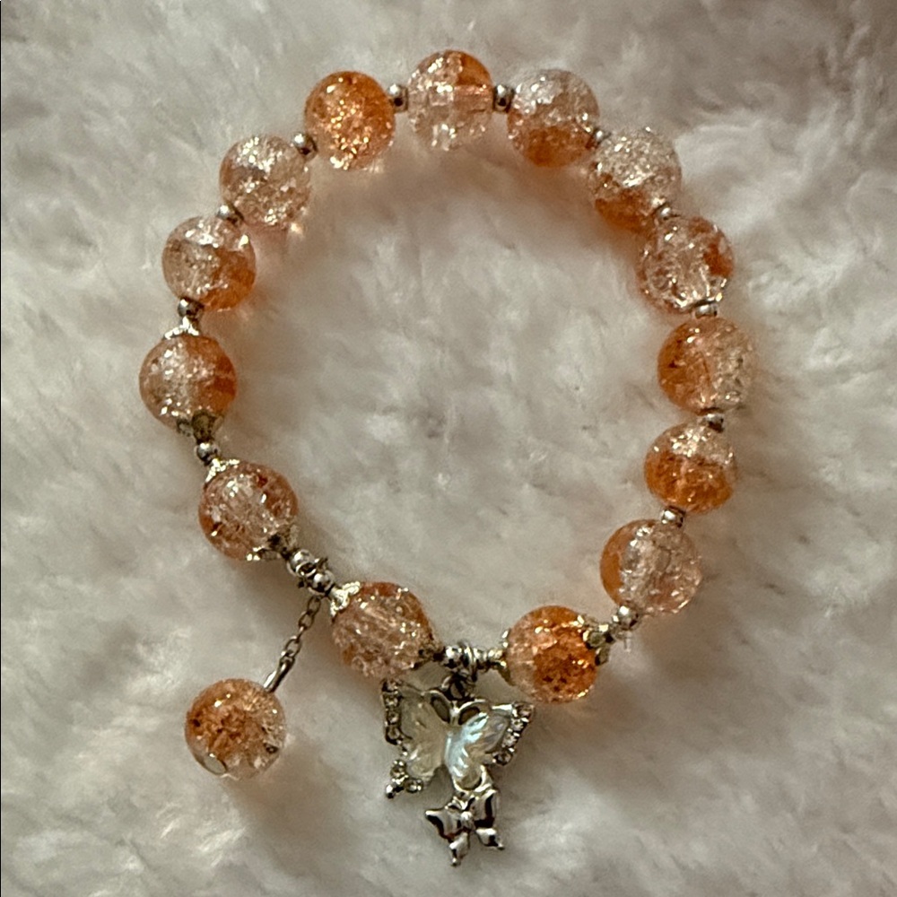Elegant Orange Beaded Bracelet with Butterfly Charm